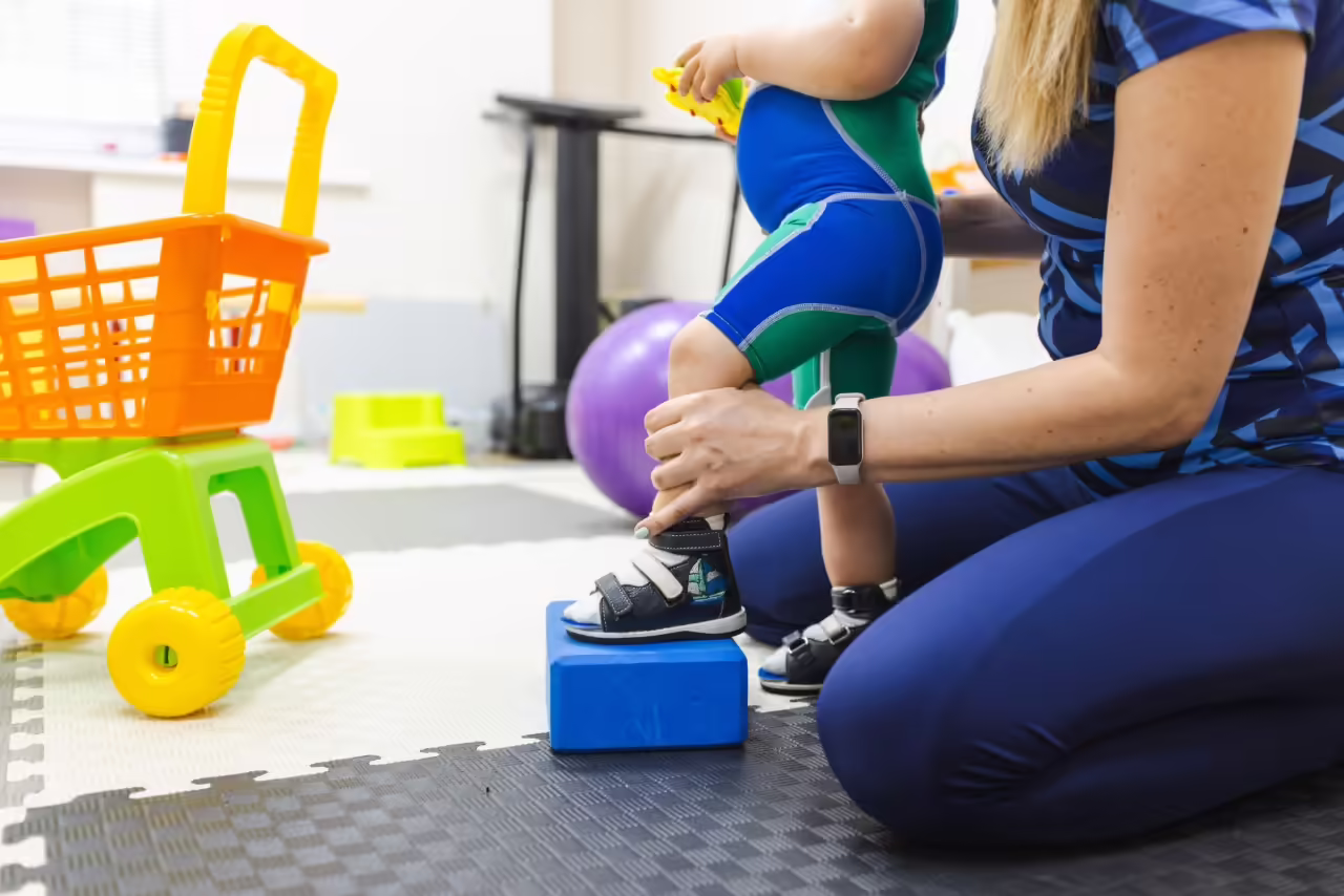 child receives physical therapy with trained adult 2026 01 09 11 34 05 utc