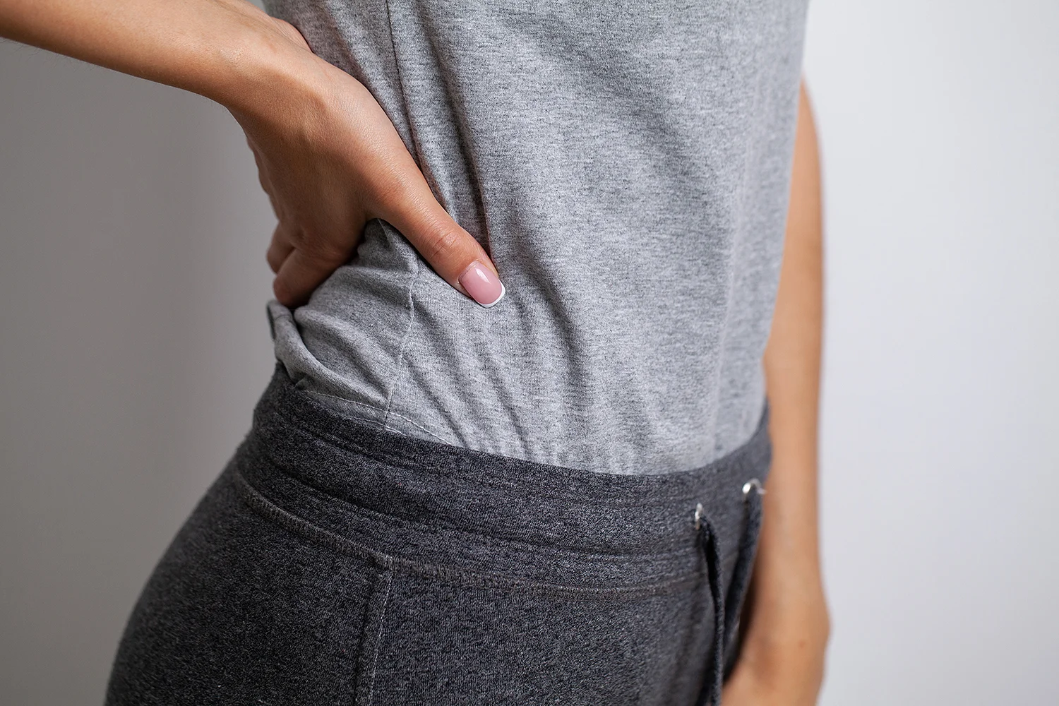 woman wearing casual clothing in a studio
